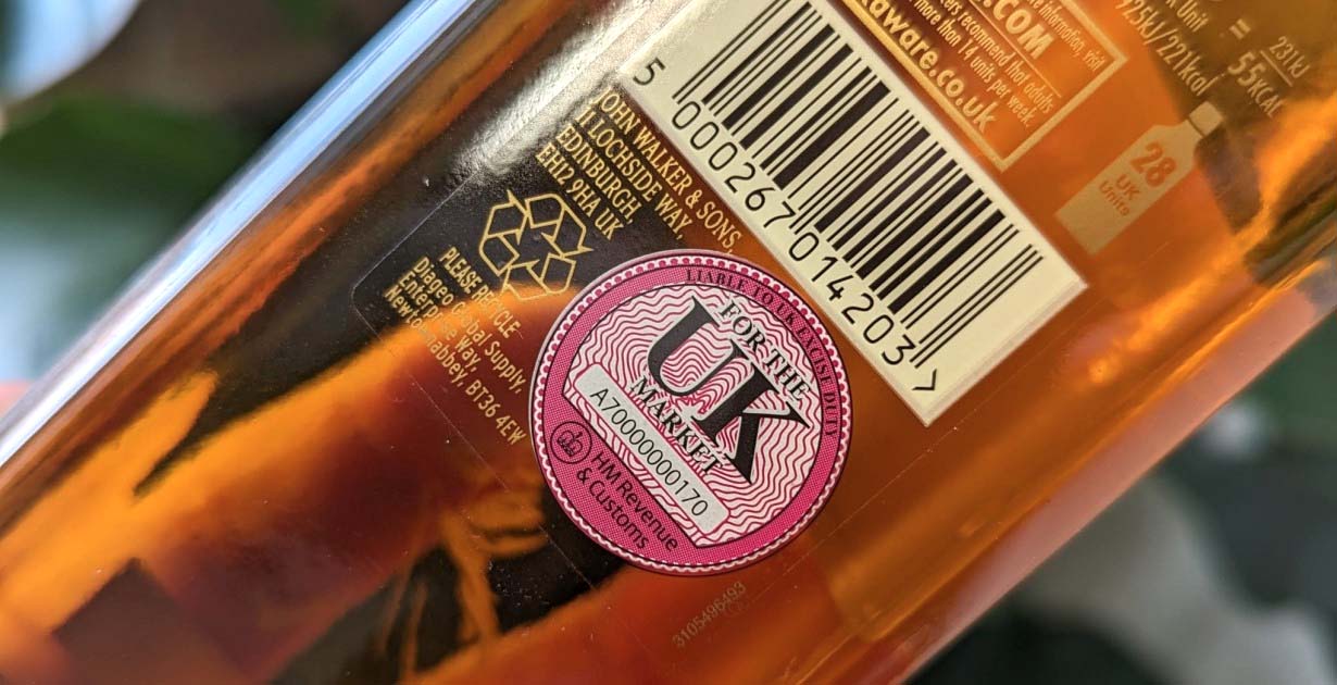 Why Those Pink Stickers on Your Whisky Bottles Are About to Vanish Forever - American Review